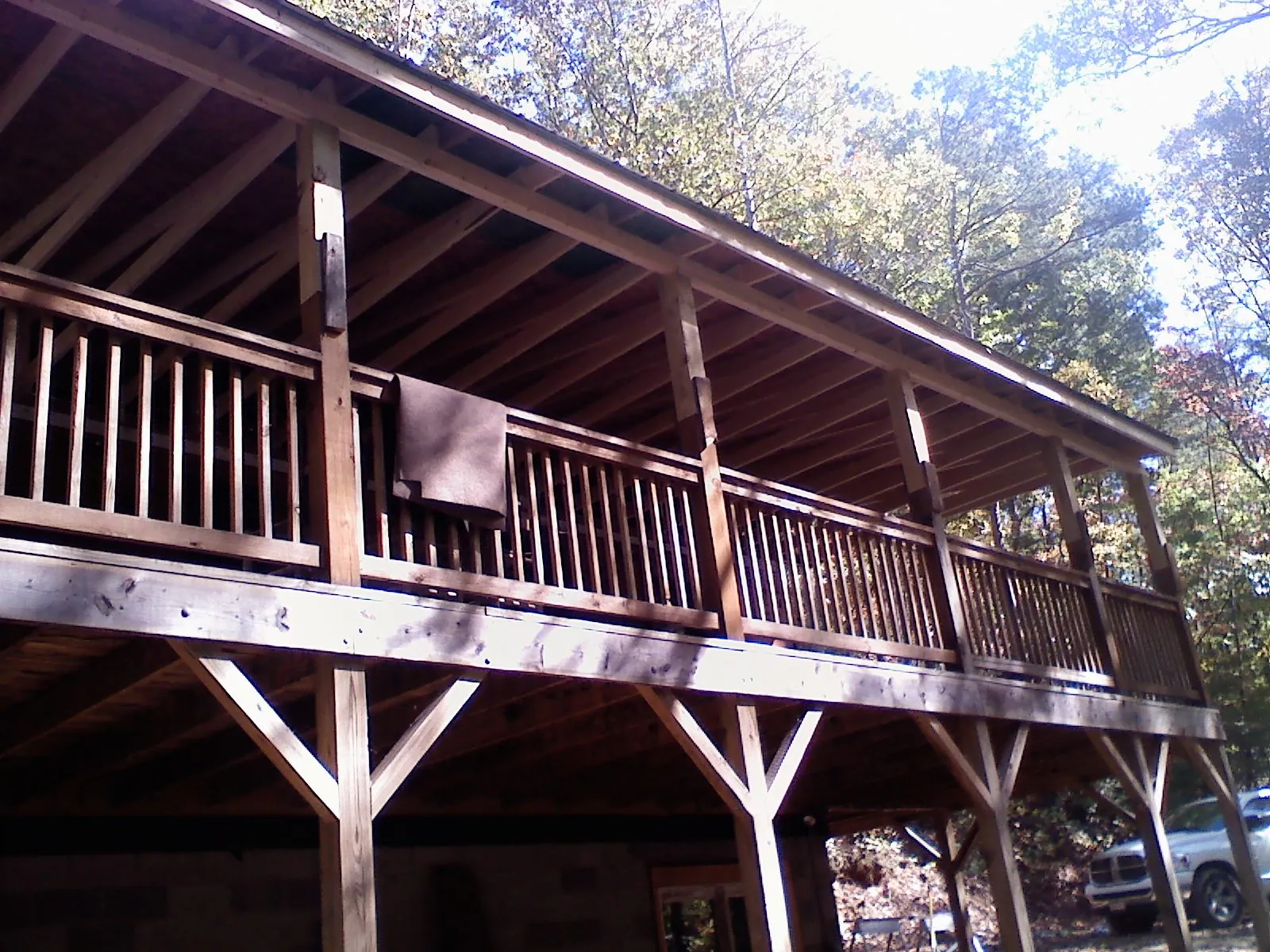 Timber framing under a new elevated porch and deck — Roof Leak Repair in Depew by Roofing Brothers